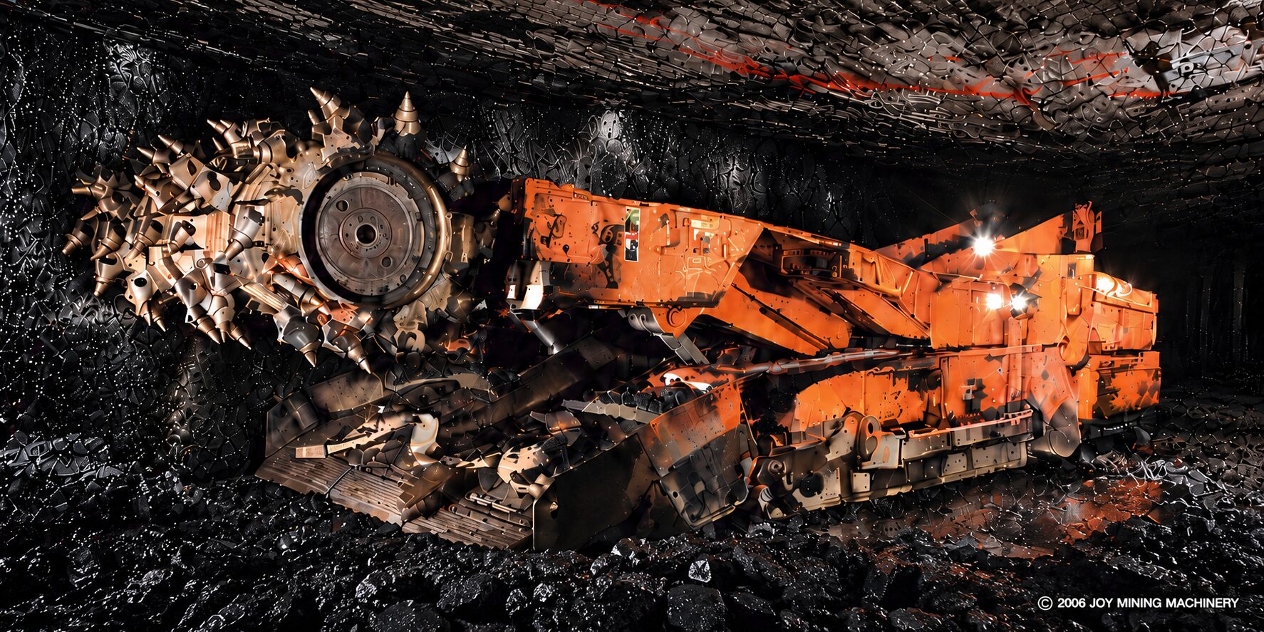 Orange continuous miner operating in an underground coal mine